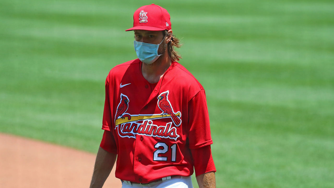 ST. LOUIS, MO - JULY 3: Andrew Miller #21 of the St. Louis Cardinals returns to the dugout during the first day of summer workouts at Busch Stadium on July 3, 2020 in St. Louis, Missouri.