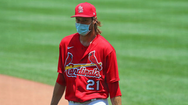 ST. LOUIS, MO - JULY 3: Andrew Miller #21 of the St. Louis Cardinals returns to the dugout during the first day of summer workouts at Busch Stadium on July 3, 2020 in St. Louis, Missouri.