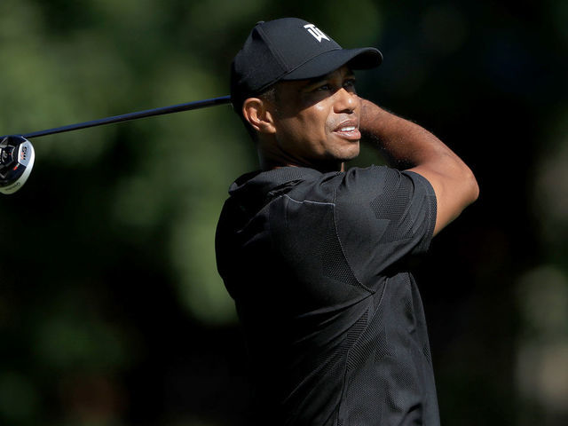 DUBLIN, OHIO - JULY 14: Tiger Woods plays a shot during a practice round prior to The Memorial Tournament at Muirfield Village Golf Club on July 14, 2020 in Dublin, Ohio.