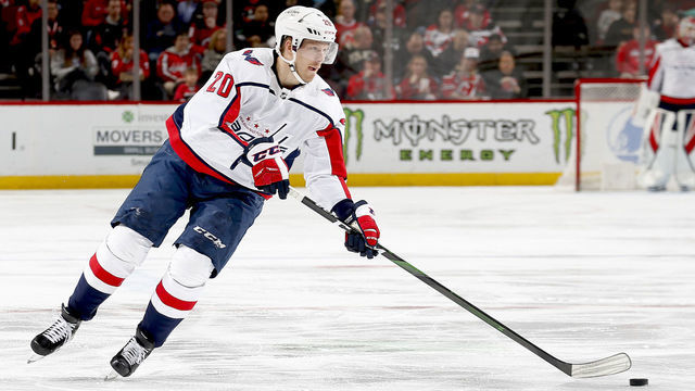 NEWARK, NJ - FEBRUARY 22: Lars Eller #20 of the Washington Capitals plays the puck against the New Jersey Devils during the game at the Prudential Center on February 22, 2020 in Newark, New Jersey. "n"n"n