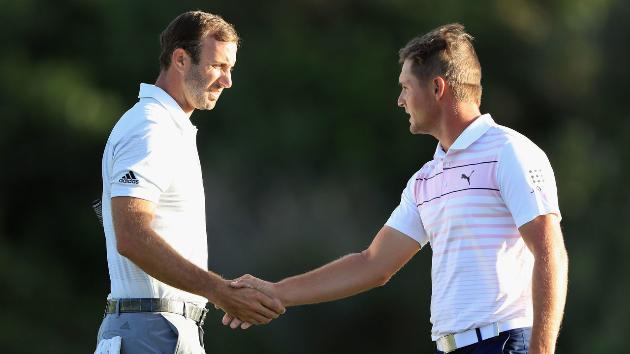 LAHAINA, HI - JANUARY 03: Dustin Johnson and Bryson DeChambeau of the United States shake hands on the 18th green during the first round of the Sentry Tournament of Champions at the Plantation Course at Kapalua Golf Club on January 3, 2019 in Lahaina, Hawaii.