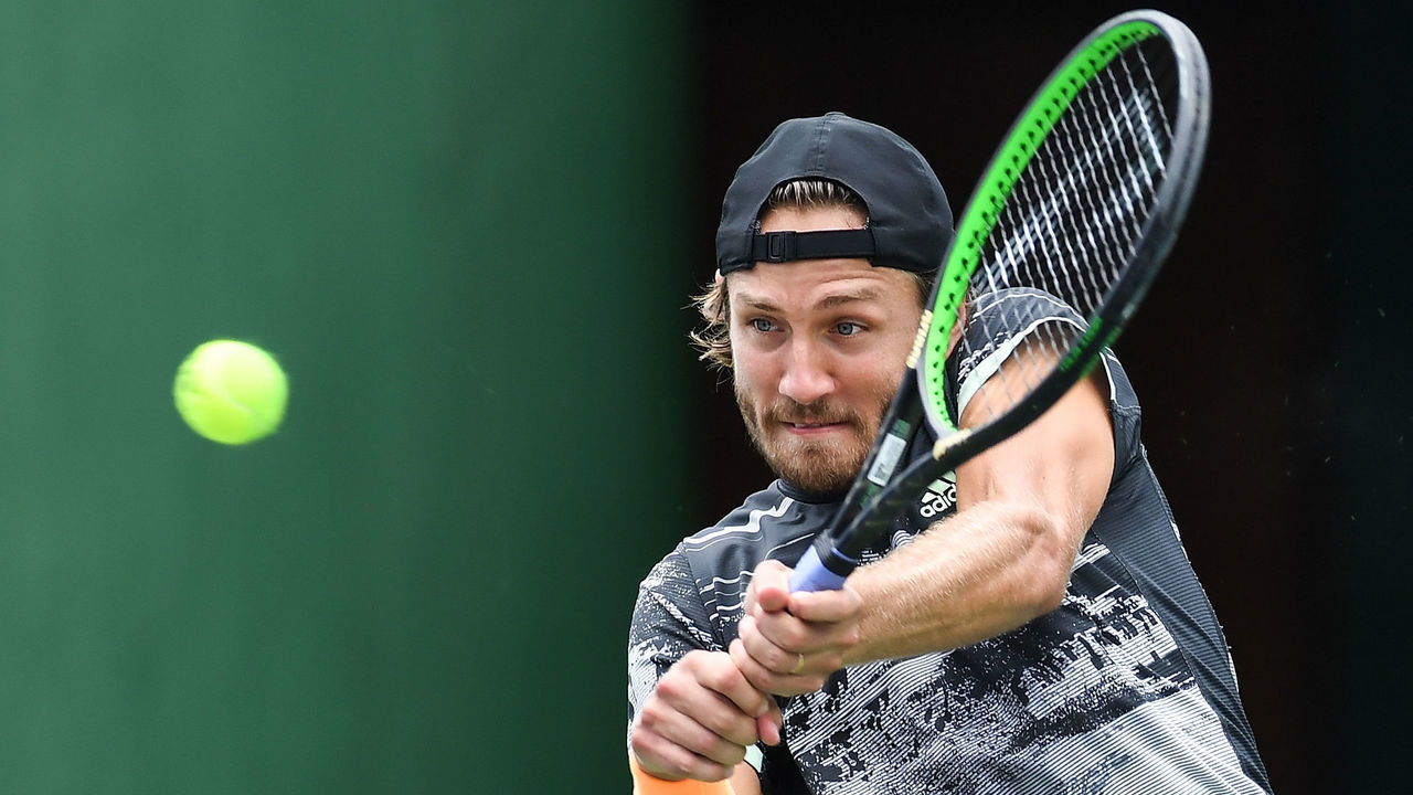 SHANGHAI, CHINA - OCTOBER 09: Lucas Pouille of France returns against John Isner of the United States on day five of 2019 Rolex Shanghai Masters at Qi Zhong Tennis Centre at Qi Zhong Tennis Centre on October 9, 2019 in Shanghai, China.