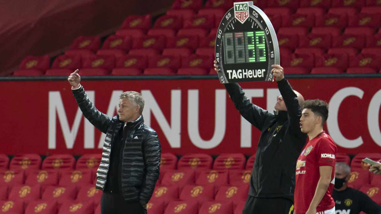 MANCHESTER, July 13, 2020 -- Manchester United's manager Ole Gunnar Solskjaer L gives a sign of substitution during the English Premier League football match between Manchester United and Southampton in Manchester, Britain, July 13, 2020. FOR EDITORIAL USE ONLY. NOT FOR SALE FOR MARKETING OR ADVERTISING CAMPAIGNS. NO USE WITH UNAUTHORIZED AUDIO, VIDEO, DATA, FIXTURE LISTS, CLUB/LEAGUE LOGOS OR "LIVE" SERVICES. ONLINE IN-MATCH USE LIMITED TO 45 IMAGES, NO VIDEO EMULATION. NO USE IN BETTING, GAMES OR SINGLE CLUB/LEAGUE/PLAYER PUBLICATIONS. (Xinhua/ via Getty Images)