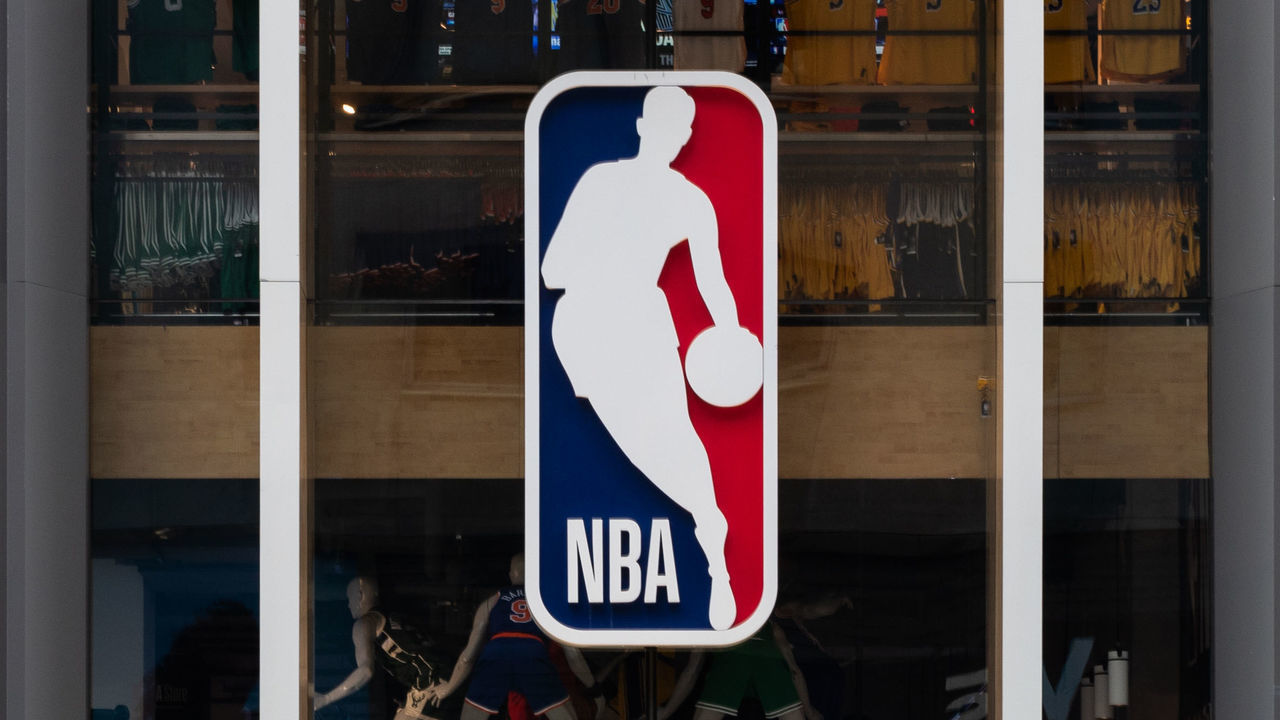 NEW YORK, NY - MARCH 12: An NBA logo is shown at the 5th Avenue NBA store on March 12, 2020 in New York City. The National Basketball Association said they would suspend all games after player Rudy Gobert of the Utah Jazz reportedly tested positive for the coronavirus.