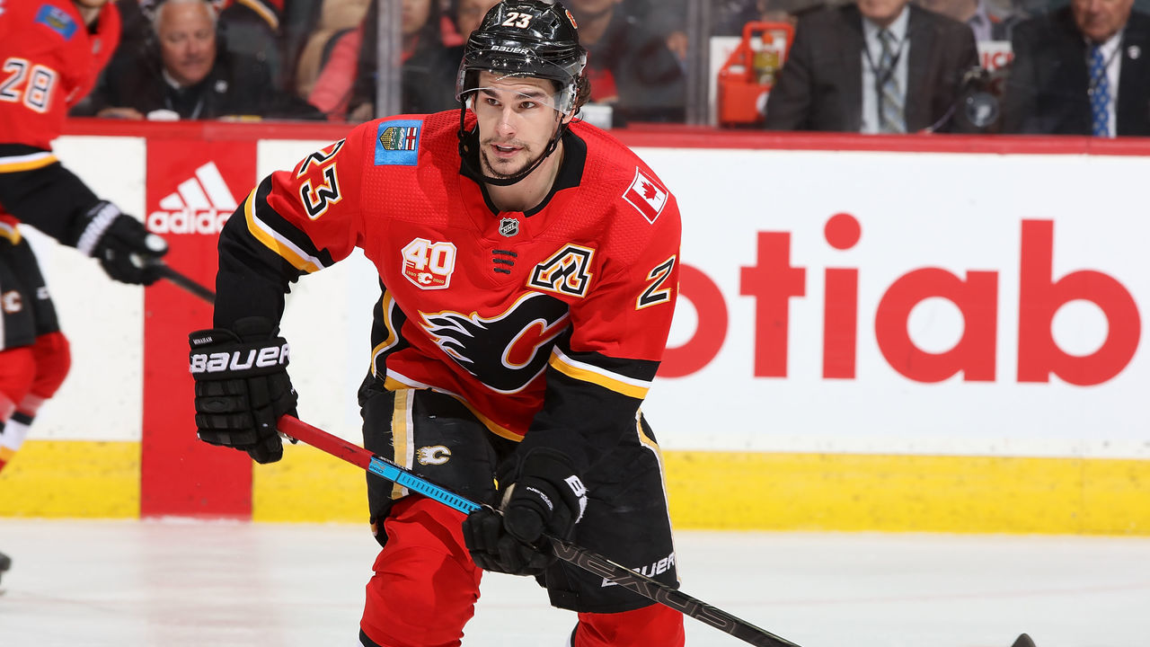 CALGARY, AB - MARCH 6: Sean Monahan #23 of the Calgary Flames skates up ice against the Arizona Coyotes at Scotiabank Saddledome on March 6, 2020 in Calgary, Alberta, Canada.