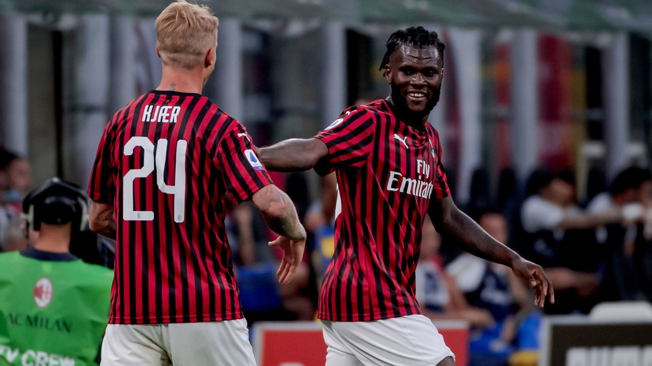 , ITALY - JULY 15: Franck Kessie of AC Milan celebrates 1-1 with Simon Kjaer of AC Milan during the Italian Serie A match between AC Milan v Parma on July 15, 2020