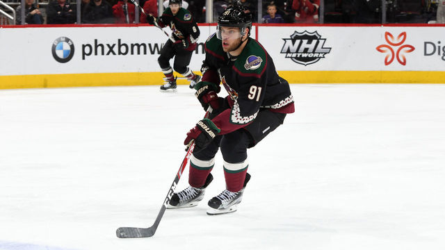 GLENDALE, ARIZONA - FEBRUARY 15: Taylor Hall #91 of the Arizona Coyotes skates with the puck against the Washington Capitals at Gila River Arena on February 15, 2020 in Glendale, Arizona.