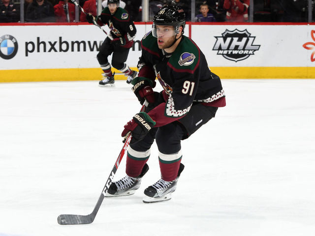 GLENDALE, ARIZONA - FEBRUARY 15: Taylor Hall #91 of the Arizona Coyotes skates with the puck against the Washington Capitals at Gila River Arena on February 15, 2020 in Glendale, Arizona.