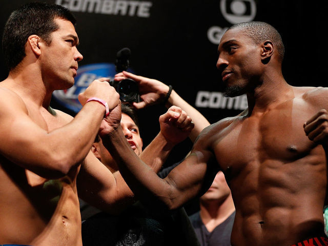 RIO DE JANEIRO, BRAZIL - AUGUST 02: (L-R) Opponents Lyoto Machida and Phil Davis face off during the UFC 163 weigh-in at HSBC Arena on August 2, 2013 in Rio de Janeiro, Brazil.