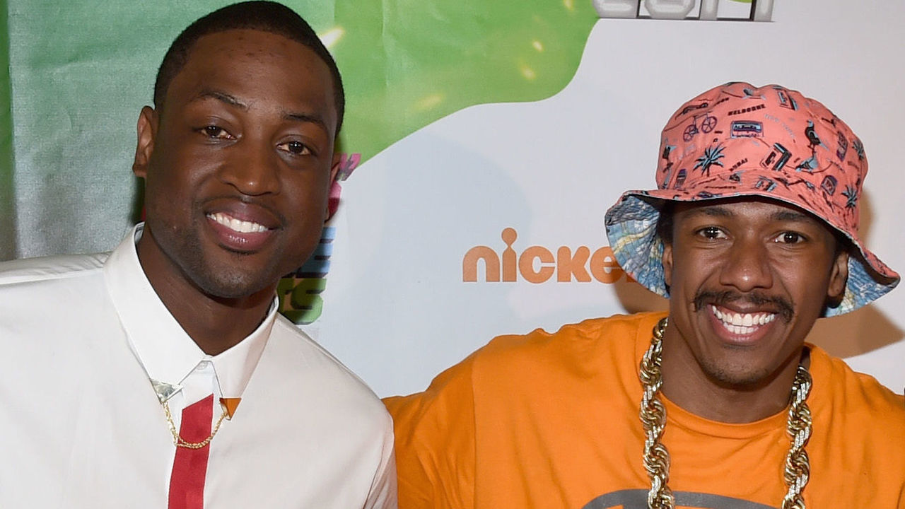LOS ANGELES, CA - JULY 17: NBA player Dwyane Wade with sons Zaire, Zion and Xavier with actor Nick Cannon attends Nickelodeon Kids' Choice Sports Awards 2014 at UCLA's Pauley Pavilion on July 17, 2014 in Los Angeles, California.