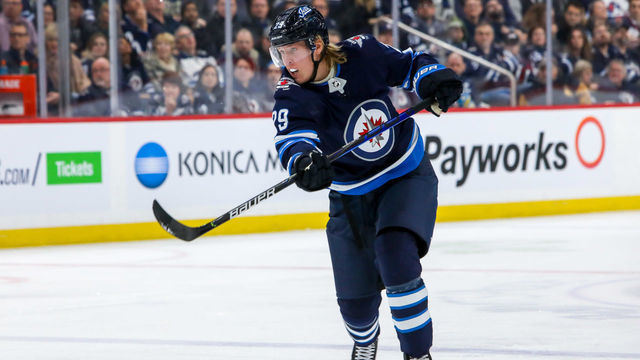 WINNIPEG, MB - MARCH 9: Patrik Laine #29 of the Winnipeg Jets takes a shot on goal during second period action against the Arizona Coyotes at the Bell MTS Place on March 9, 2020 in Winnipeg, Manitoba, Canada. The Jets defeated the Coyotes 4-2.
