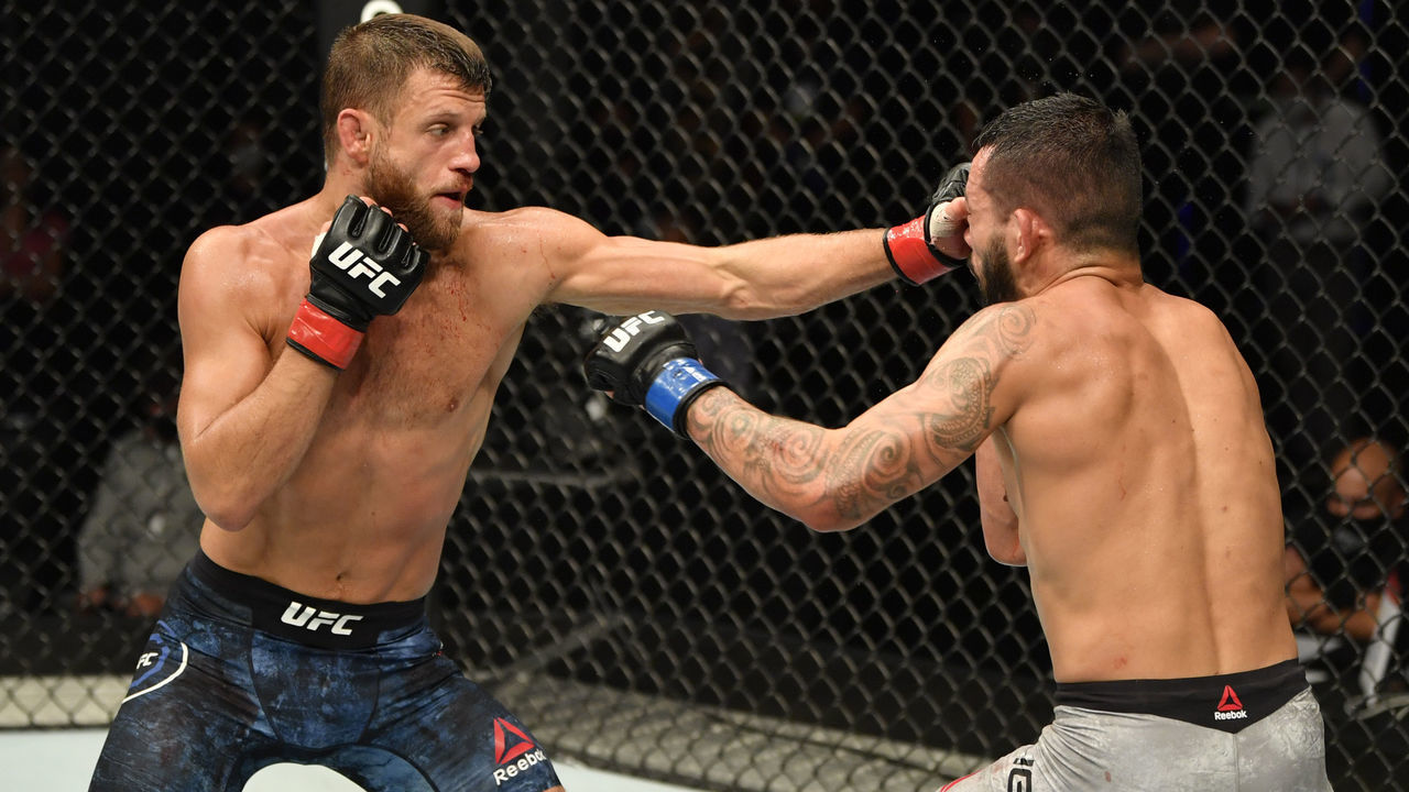 ABU DHABI, UNITED ARAB EMIRATES - JULY 16: (L-R) Calvin Kattar punches Dan Ige in their featherweight fight during the UFC Fight Night event inside Flash Forum on UFC Fight Island on July 16, 2020 in Yas Island, Abu Dhabi, United Arab Emirates.