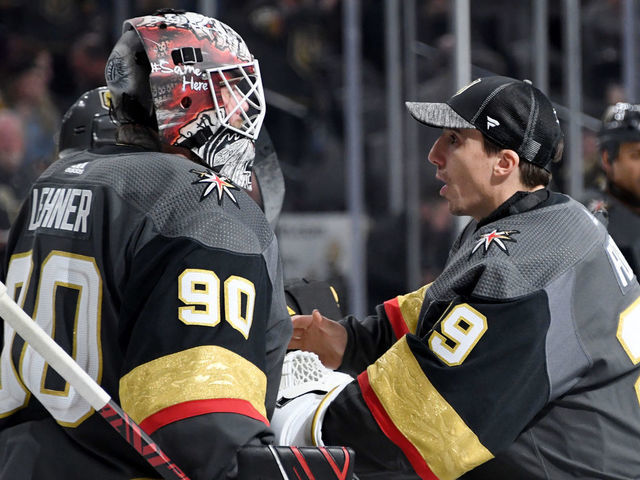 LAS VEGAS, NEVADA - FEBRUARY 28: Robin Lehner #90 and Marc-Andre Fleury #29 of the Vegas Golden Knights celebrate on the ice after the team's 4-2 victory over the Buffalo Sabres at T-Mobile Arena on February 28, 2020 in Las Vegas, Nevada.