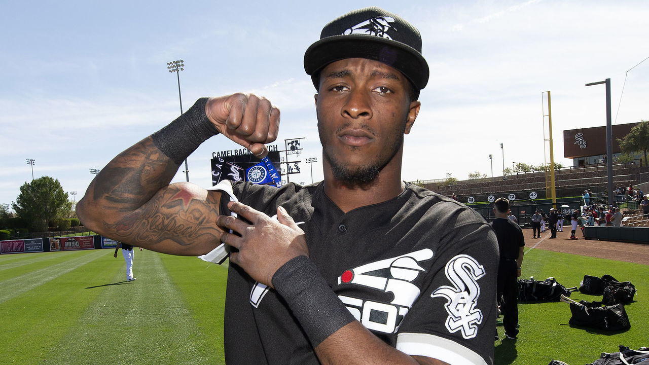 GLENDALE, ARIZONA - FEBRUARY 27: Tim Anderson #7 of the Chicago White Sox flexes his muscles prior to the game against the Seattle Mariners on February 27, 2020 at Camelback Ranch in Glendale Arizona.