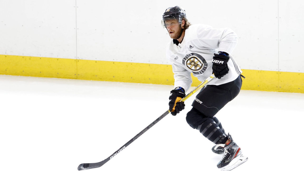 BOSTON, MA - JULY 15: Boston Bruins right wing David Pastrnak (88) takes a peek at goal during Bruins Training Camp on July 15, 2020, at Warrior Ice Arena in Boston, Massachusetts.