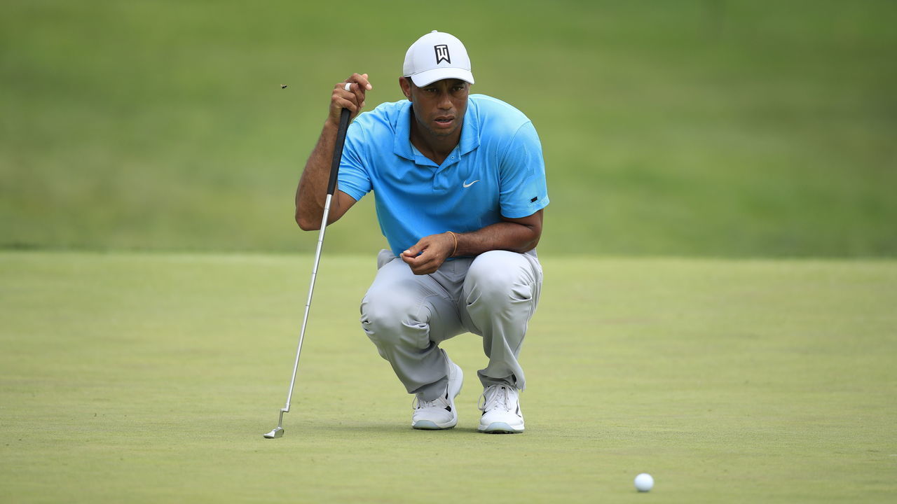 DUBLIN, OHIO - JULY 16: Tiger Woods of the United States lines up a putt on the tenth green during the first round of The Memorial Tournament on July 16, 2020 at Muirfield Village Golf Club in Dublin, Ohio.