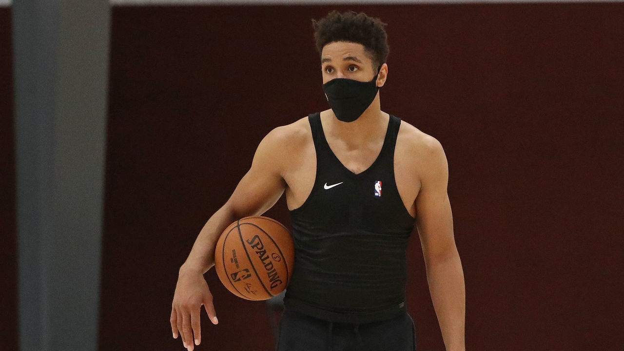 ORLANDO, FL - JULY 16: Malcolm Brogdon #7 and Popeye Jones of the Indiana Pacers walk on the court during practice as part of the NBA Restart 2020 on July 16, 2020 in Orlando, Florida. NOTE TO USER: User expressly acknowledges and agrees that, by downloading and/or using this photograph, user is consenting to the terms and conditions of the Getty Images License Agreement. Mandatory Copyright Notice: Copyright 2020 NBAE