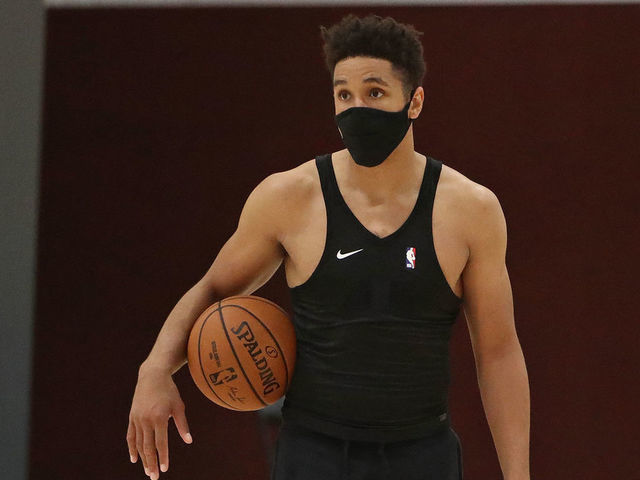 ORLANDO, FL - JULY 16: Malcolm Brogdon #7 and Popeye Jones of the Indiana Pacers walk on the court during practice as part of the NBA Restart 2020 on July 16, 2020 in Orlando, Florida. NOTE TO USER: User expressly acknowledges and agrees that, by downloading and/or using this photograph, user is consenting to the terms and conditions of the Getty Images License Agreement. Mandatory Copyright Notice: Copyright 2020 NBAE