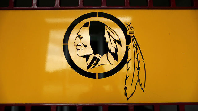 LANDOVER, MARYLAND - JULY 13: The NFL's Washington Redskin's logo is stamped in a steel gate at FedEx Field July 13, 2020 in Landover, Maryland. The team announced Monday that owner Daniel Snyder and coach Ron Rivera are working on finding a replacement for its racist name and logo after 87 years.