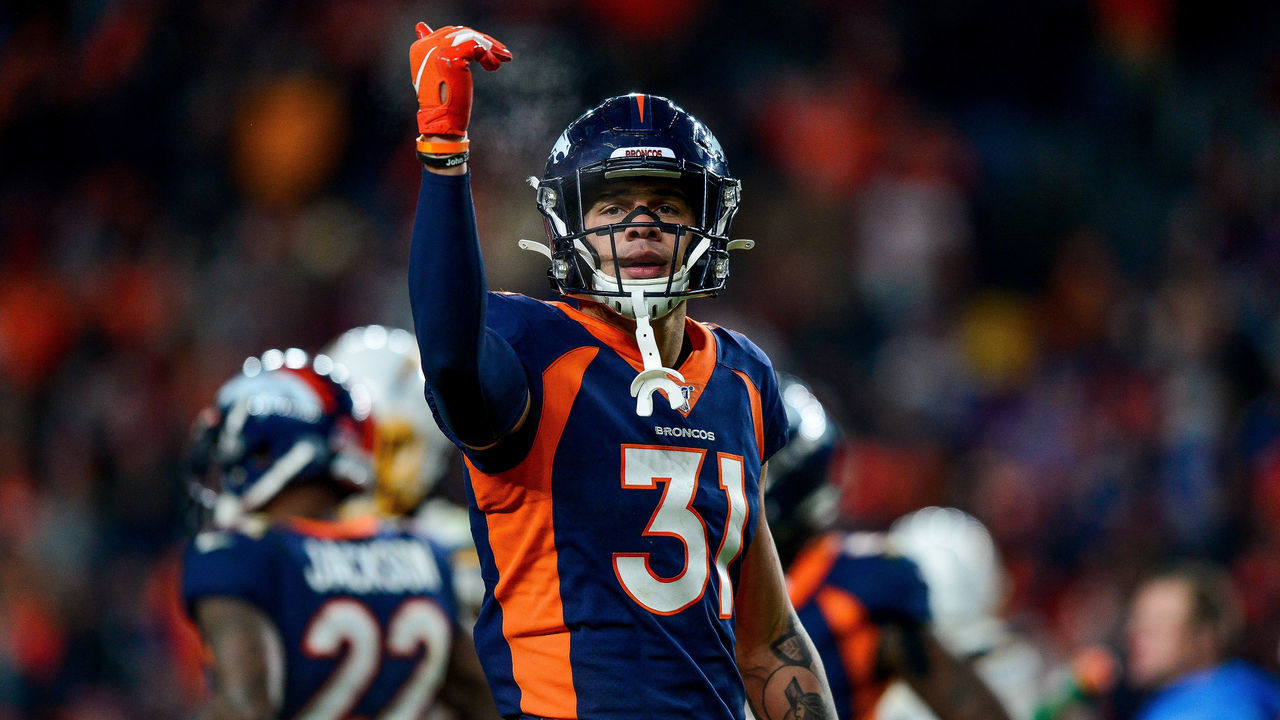 DENVER, CO - DECEMBER 1: Justin Simmons #31 of the Denver Broncos celebrates after a fourth quarter defensive stop against the Los Angeles Chargers at Empower Field at Mile High on December 1, 2019 in Denver, Colorado.