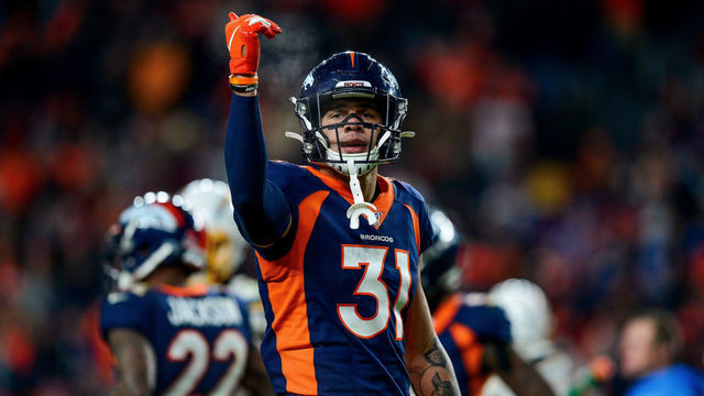 DENVER, CO - DECEMBER 1: Justin Simmons #31 of the Denver Broncos celebrates after a fourth quarter defensive stop against the Los Angeles Chargers at Empower Field at Mile High on December 1, 2019 in Denver, Colorado.