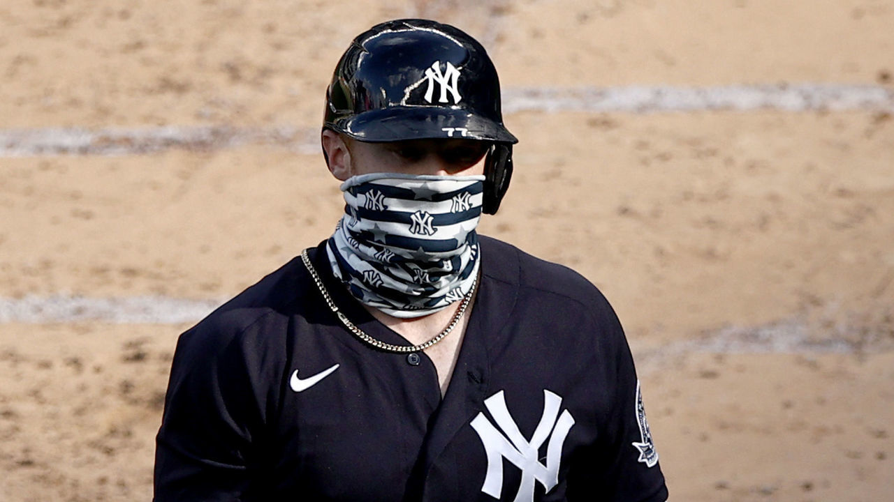 NEW YORK, NEW YORK - JULY 14: Clint Frazier #77 of the New York Yankees walks back to the dugout after he struck out during an intra squad game of summer workouts at Yankee Stadium on July 14, 2020 in the Bronx borough of New York City.