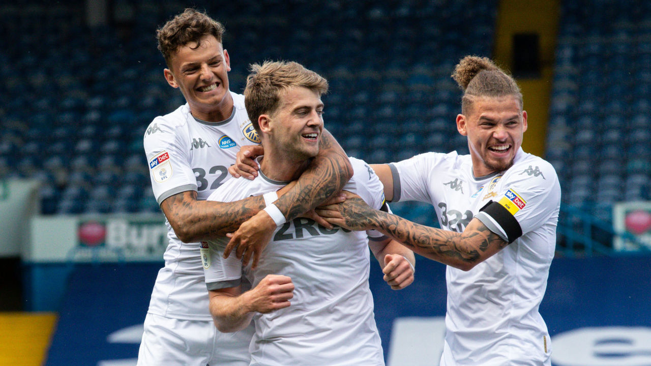 LEEDS, ENGLAND - JUNE 27: Leeds United's Patrick Bamford celebrates scoring the opening goal with teammates during the Sky Bet Championship match between Leeds United and Fulham at Elland Road on June 27, 2020 in Leeds, England.