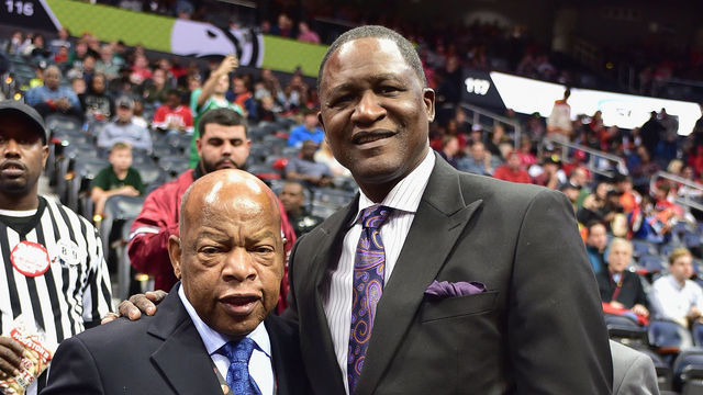 ATLANTA, GA - NOVEMBER 24: (L-R) Congressman John Lewis and Former NBA player Dominique Wilkins attend Boston Celtics vs Atlanta Hawks game where Former NBA Player and Hall of Famer Dikembe Mutombo gets his #55 Atlanta Hawks Jersey retired during half time at Philips Arena on November 24, 2015 in Atlanta, Georgia.