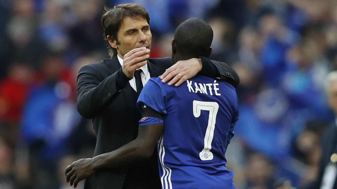 Chelsea's Italian head coach Antonio Conte (L) celebrates victory with Chelsea's French midfielder N'Golo Kante after the FA Cup semi-final football match between Tottenham Hotspur and Chelsea at Wembley stadium in London on April 22, 2017. / AFP PHOTO / Adrian DENNIS / NOT FOR MARKETING OR ADVERTISING USE / RESTRICTED TO EDITORIAL USE