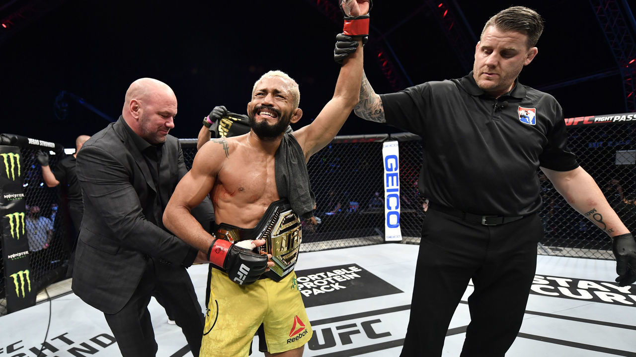 ABU DHABI, UNITED ARAB EMIRATES - JULY 19: In this handout image provided by UFC, Deiveson Figueiredo of Brazil celebrates after defeating Joseph Benavidez in their UFC flyweight championship bout during the UFC Fight Night event inside Flash Forum on UFC Fight Island on July 19, 2020 in Yas Island, Abu Dhabi, United Arab Emirates.