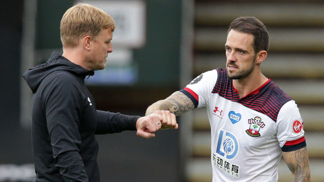 BOURNEMOUTH, ENGLAND - JULY 19: Goal-scorer Danny Ings of Southampton with his former Cherries boss Eddie Howe of Bournemouth after the Saints 2-0 win during the Premier League match between AFC Bournemouth and Southampton FC at Vitality Stadium on July 19, 2020 in Bournemouth, England. Football Stadiums around Europe remain empty due to the Coronavirus Pandemic as Government social distancing laws prohibit fans inside venues resulting in all fixtures being played behind closed doors.