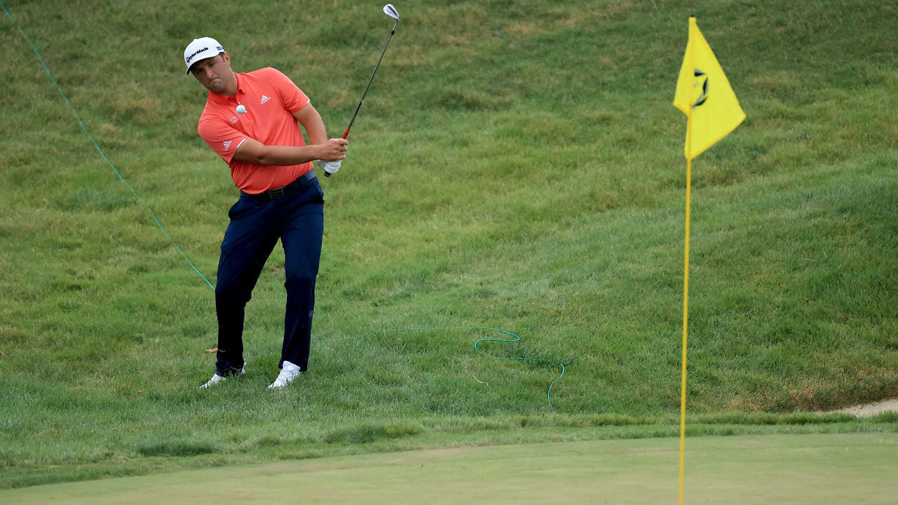 DUBLIN, OHIO - JULY 19: Jon Rahm of Spain chips in for birdie on the 16th hole during the final round of The Memorial Tournament on July 19, 2020 at Muirfield Village Golf Club in Dublin, Ohio.