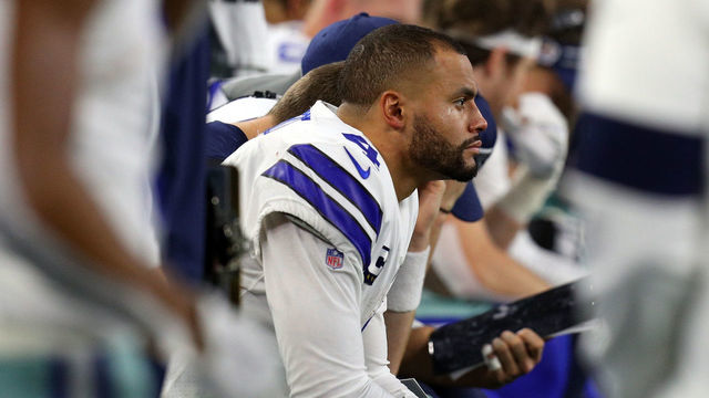 ARLINGTON, TEXAS - NOVEMBER 28: Dak Prescott #4 of the Dallas Cowboys sits on the bench in the fourth quarter of the game against the Buffalo Bills at AT&T Stadium on November 28, 2019 in Arlington, Texas.