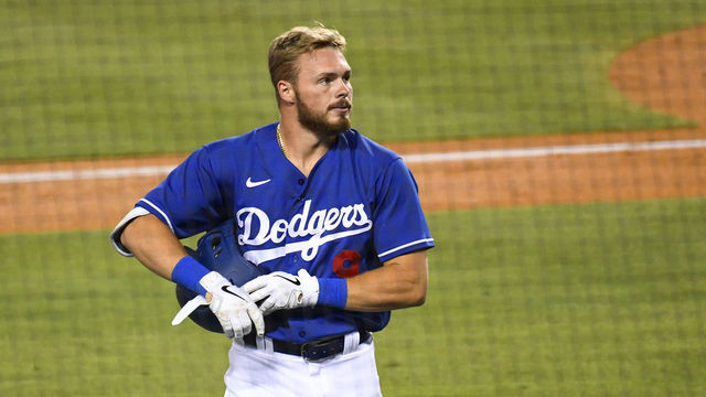 LOS ANGELES, CA - JULY 20: Los Angeles Dodgers infielder Gavin Lux (9) looks on after grounding out during a MLB exhibition game between the Arizona Diamondbacks and the Los Angeles Dodgers on July 20, 2020 at Dodger Stadium in Los Angeles, CA.
