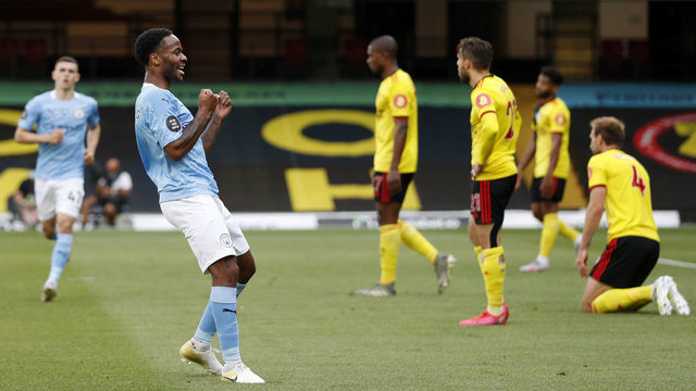 WATFORD, ENGLAND - JULY 21: Raheem Sterling of Manchester City celebrates with his team after he scores his teams first goal during the Premier League match between Watford FC and Manchester City at Vicarage Road on July 21, 2020 in Watford, England. Football Stadiums around Europe remain empty due to the Coronavirus Pandemic as Government social distancing laws prohibit fans inside venues resulting in all fixtures being played behind closed doors.