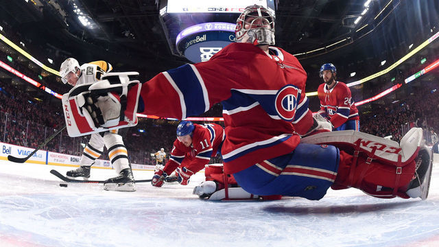 MONTREAL, QC - MARCH 2: Carey Price #31 of the Montreal Canadiens defends the goal against Sidney Crosby #87 of the Pittsburgh Penguins in the NHL game at the Bell Centre on March 2, 2019 in Montreal, Quebec, Canada.