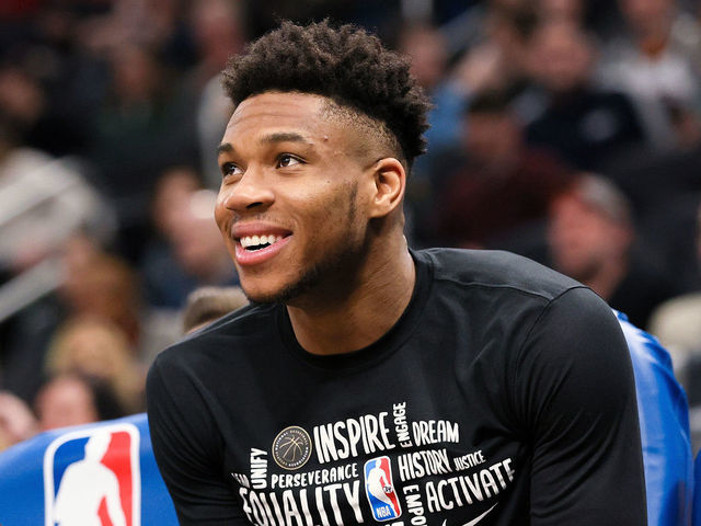 MILWAUKEE, WISCONSIN - FEBRUARY 28: Giannis Antetokounmpo #34 of the Milwaukee Bucks looks on from the bench in the fourth quarter against the Oklahoma City Thunder at the Fiserv Forum on February 28, 2020 in Milwaukee, Wisconsin.
