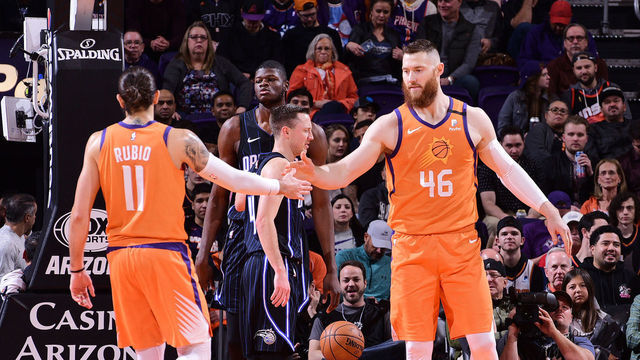 PHOENIX, AZ - JANUARY 10: Ricky Rubio #11 of the Phoenix Suns high-fives Aron Baynes #46 of the Phoenix Suns against the Orlando Magic on January 10, 2020 at Talking Stick Resort Arena in Phoenix, Arizona. Mandatory Copyright Notice: Copyright 2020 NBAE