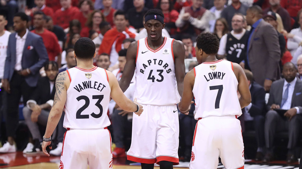 TORONTO, CANADA - JUNE 2: Pascal Siakam #43 hi-fives fred Vanvleet #23 and Kyle Lowry #7 of the Toronto Raptors during Game Two of the NBA Finals on June 2, 2019 at Scotiabank Arena in Toronto, Ontario, Canada. NOTE TO USER: User expressly acknowledges and agrees that, by downloading and/or using this photograph, user is consenting to the terms and conditions of the Getty Images License Agreement. Mandatory Copyright Notice: Copyright 2019 NBAE