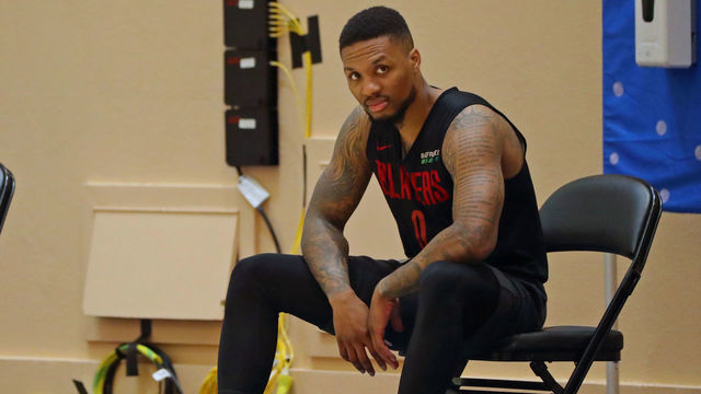 ORLANDO, FL - JULY 13: Damian Lillard #0 of the Portland Trail Blazers looks on during practice as part of the NBA Restart 2020 on July 13, 2020 in Orlando, Florida. NOTE TO USER: User expressly acknowledges and agrees that, by downloading and/or using this photograph, user is consenting to the terms and conditions of the Getty Images License Agreement. Mandatory Copyright Notice: Copyright 2020 NBAE