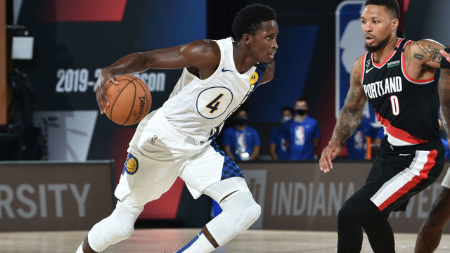 Orlando, FL - JULY 23: Victor Oladipo #4 of the Indiana Pacers handles the ball against the Portland Trail Blazers during a scrimmage on July 23, 2020 at The Arena at ESPN Wide World of Sports in Orlando, Florida. NOTE TO USER: User expressly acknowledges and agrees that, by downloading and/or using this Photograph, user is consenting to the terms and conditions of the Getty Images License Agreement. Mandatory Copyright Notice: Copyright 2020 NBAE