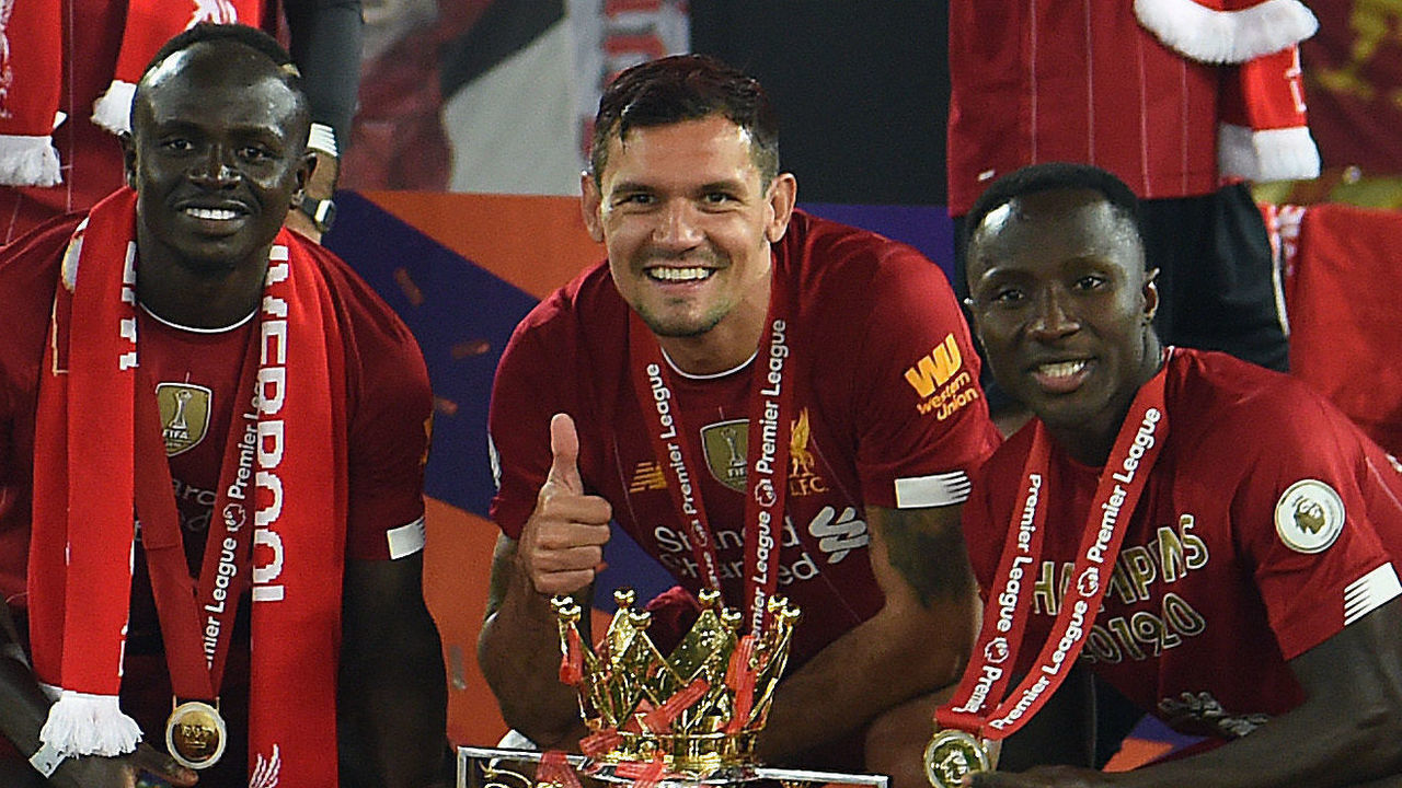 LIVERPOOL, ENGLAND - JULY 22: (THE SUN ON SUNDAY OUT) Naby Keita of Liverpool and Sadio Mane of Liverpool with Dejan Lovren of Liverpool with the Premier League Trophy between Liverpool FC and Chelsea FC at Anfield on July 22, 2020 in Liverpool, England. (THE SUN ON SUNDAY OUT)