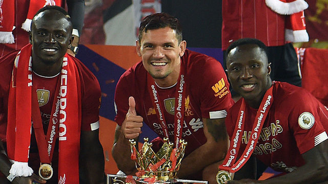 LIVERPOOL, ENGLAND - JULY 22: (THE SUN ON SUNDAY OUT) Naby Keita of Liverpool and Sadio Mane of Liverpool with Dejan Lovren of Liverpool with the Premier League Trophy between Liverpool FC and Chelsea FC at Anfield on July 22, 2020 in Liverpool, England. (THE SUN ON SUNDAY OUT)