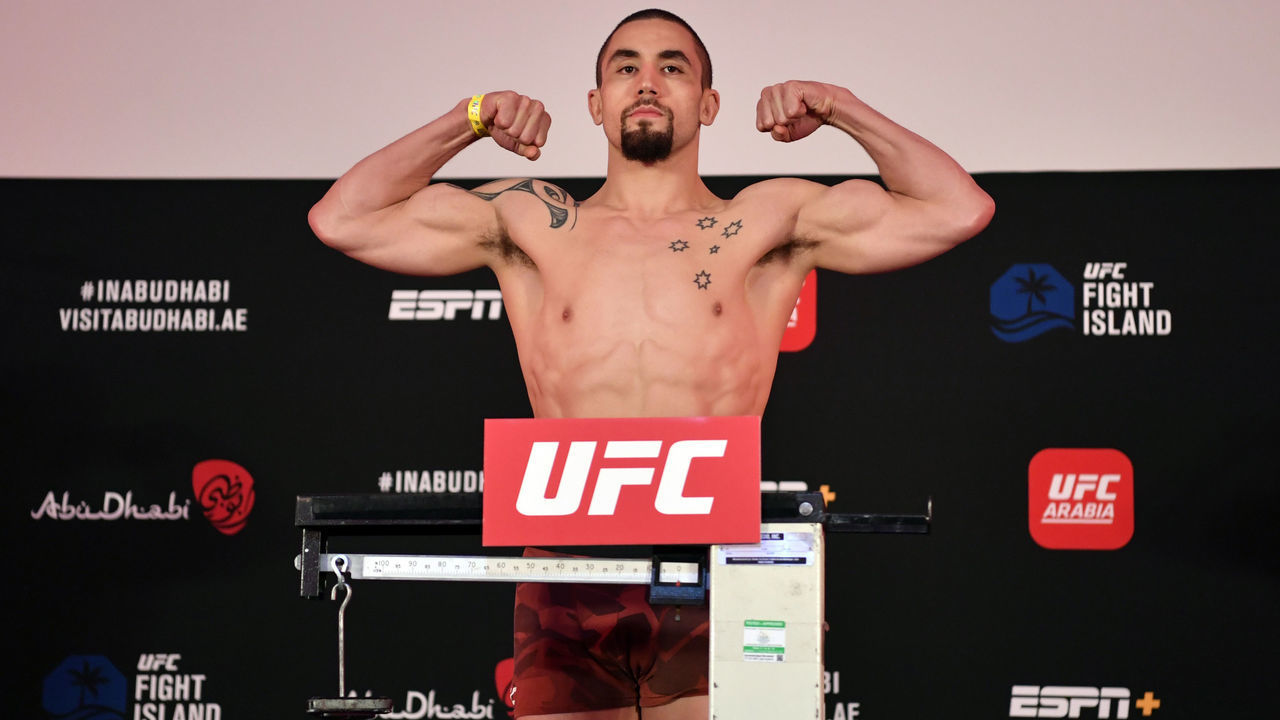 ABU DHABI, UNITED ARAB EMIRATES - JULY 24: Robert Whittaker of New Zealand poses on the scale during the UFC Fight Night weigh-in inside Flash Forum on UFC Fight Island on July 24, 2020 in Yas Island, Abu Dhabi, United Arab Emirates.