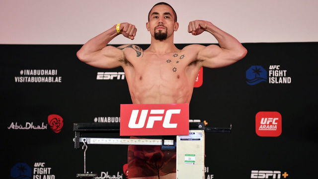 ABU DHABI, UNITED ARAB EMIRATES - JULY 24: Robert Whittaker of New Zealand poses on the scale during the UFC Fight Night weigh-in inside Flash Forum on UFC Fight Island on July 24, 2020 in Yas Island, Abu Dhabi, United Arab Emirates.