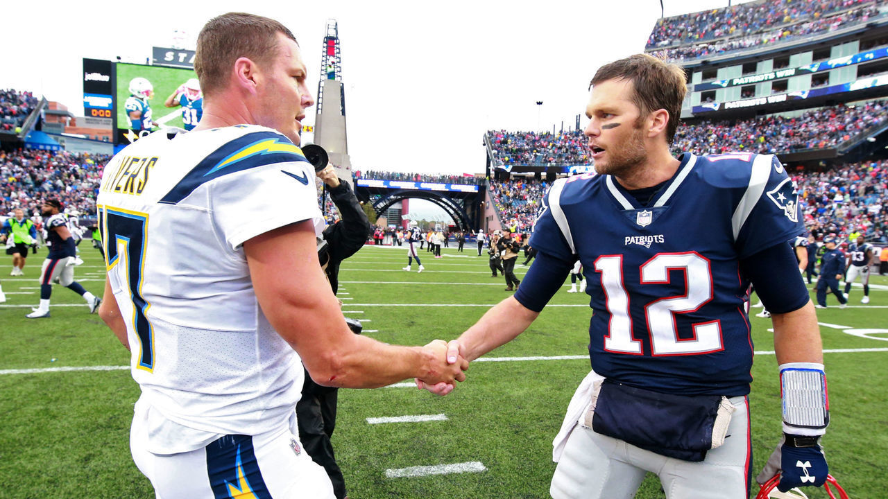 FOXBOROUGH, MA - OCTOBER 29: New England Patriots quarterback Tom Brady shakes hands with Los Angeles Chargers Philip Rivers after they defeated the Chargers 21-13 at Gillette Stadium in Foxborough, Mass., on Oct. 29, 2017.