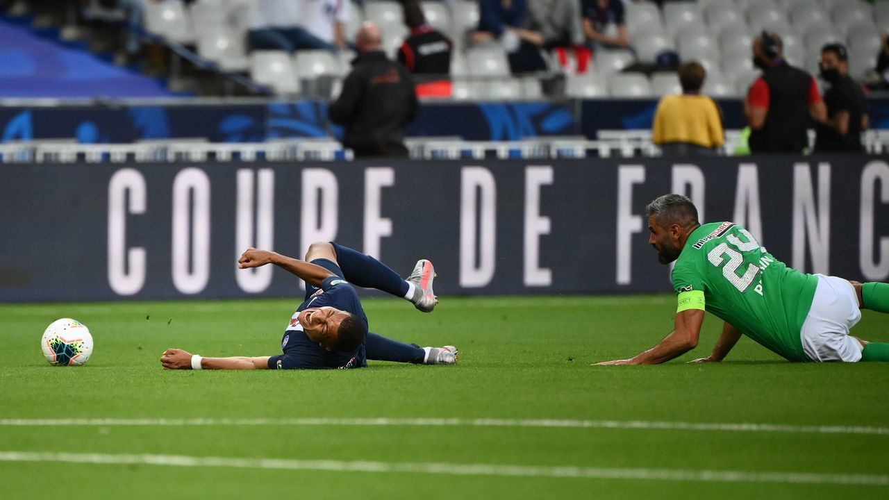 Paris Saint-Germain's French forward Kylian Mbappe reacts as he is fouled during the French Cup final football match between Paris Saint-Germain (PSG) and Saint-Etienne (ASSE) on July 24, 2020, at the Stade de France in Saint-Denis, outside Paris.