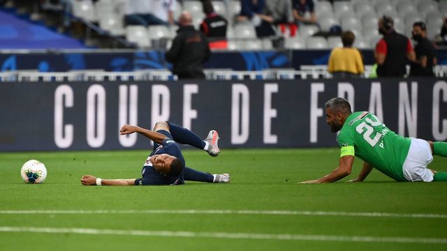 Paris Saint-Germain's French forward Kylian Mbappe reacts as he is fouled during the French Cup final football match between Paris Saint-Germain (PSG) and Saint-Etienne (ASSE) on July 24, 2020, at the Stade de France in Saint-Denis, outside Paris.