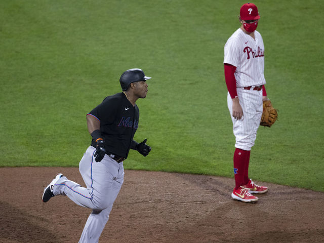 Aguilar leads Marlins over Phillies 5-2 in Girardi's debut