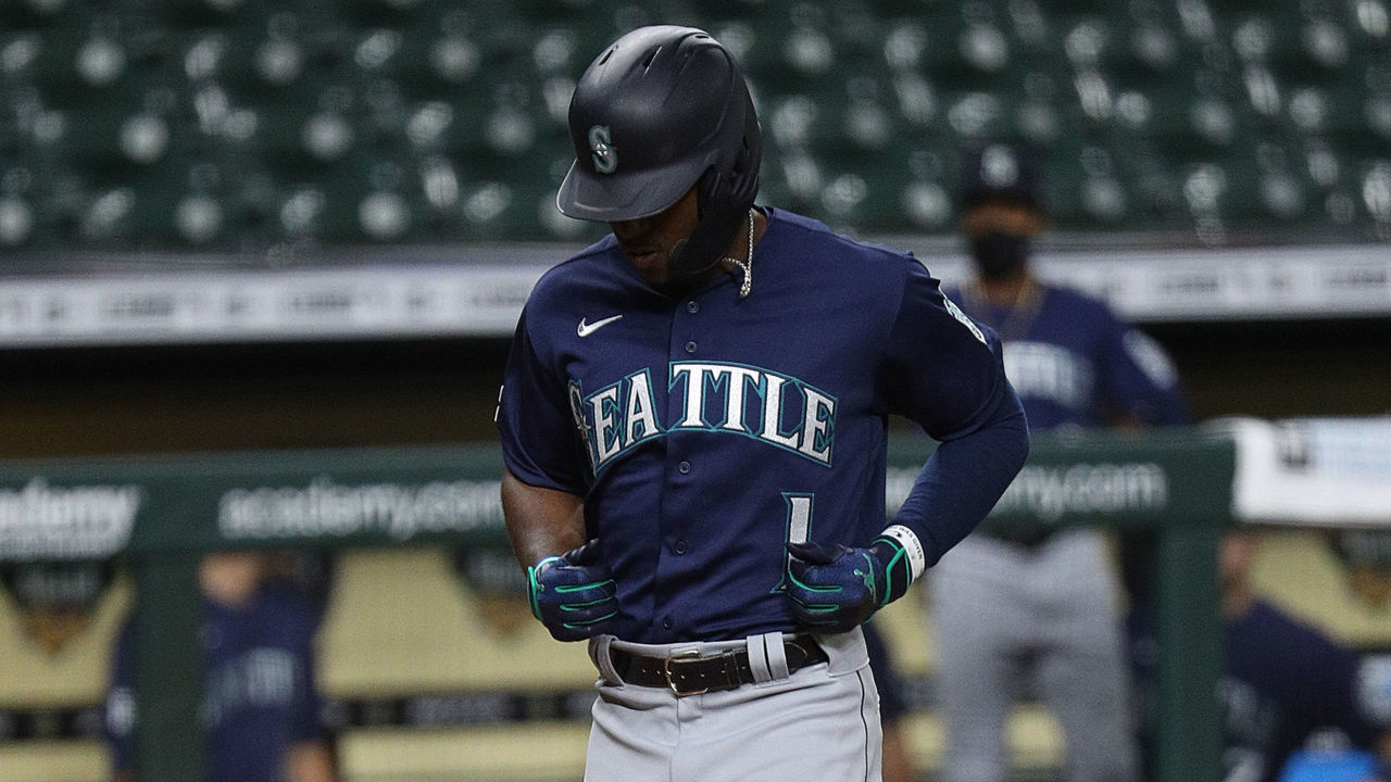 HOUSTON, TEXAS - JULY 24: Kyle Lewis #1 of the Seattle Mariners hits a home run in the second inning against the Houston Astros during Opening Day at Minute Maid Park on July 24, 2020 in Houston, Texas. The 2020 season had been postponed since March due to the COVID-19 pandemic.
